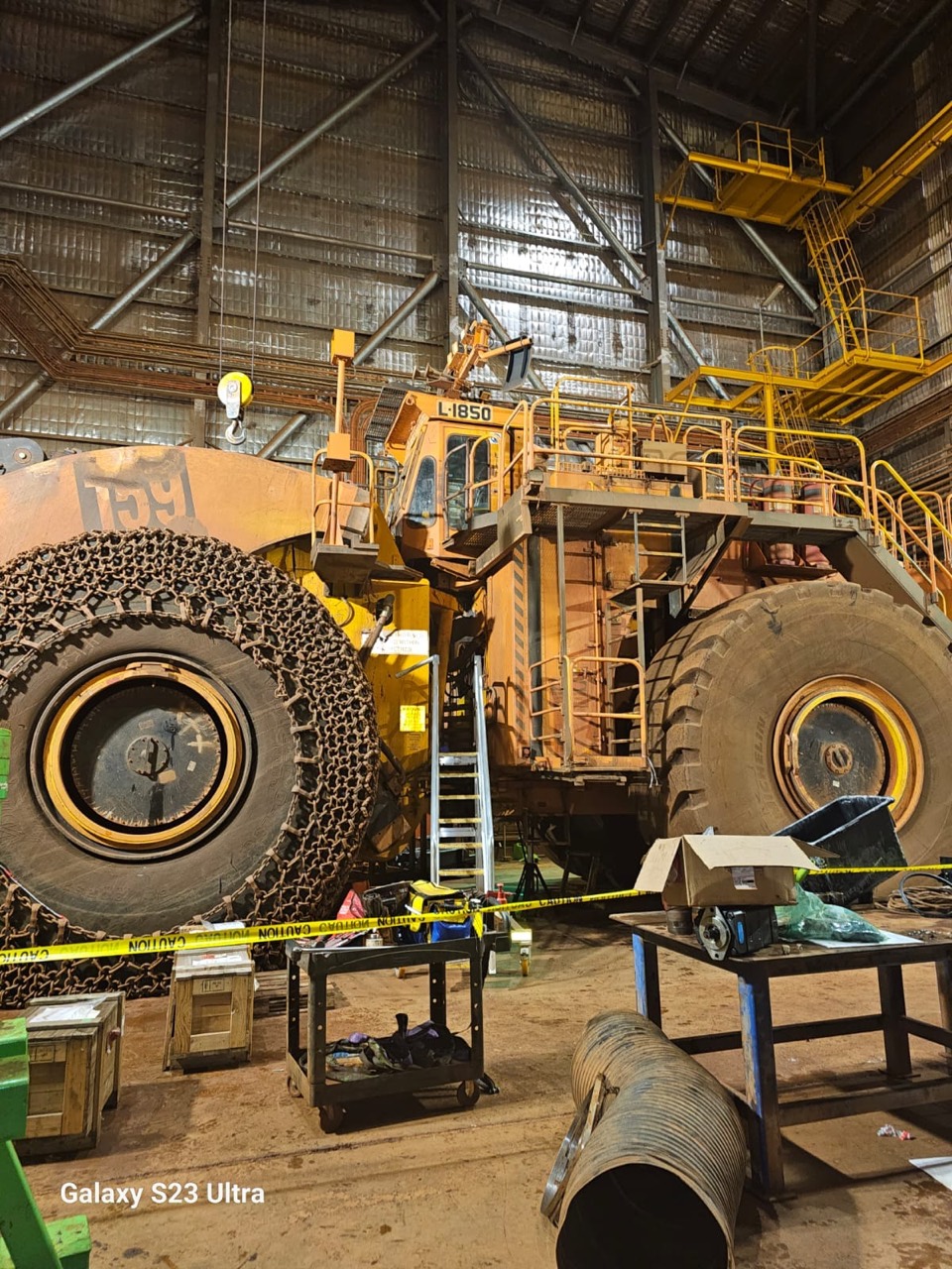 Large loader inside a workshop